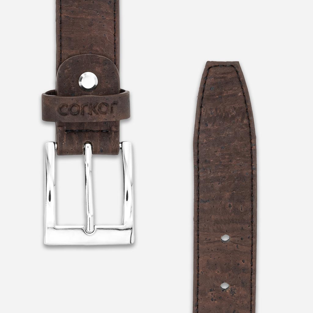 Square silver-tone buckle and strap of a cork belt for men.
