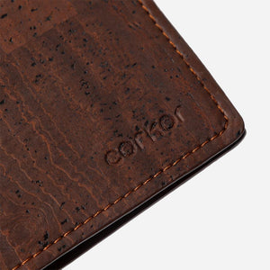 Closeup on the Corkor logo of the Bifold Wallet for men.