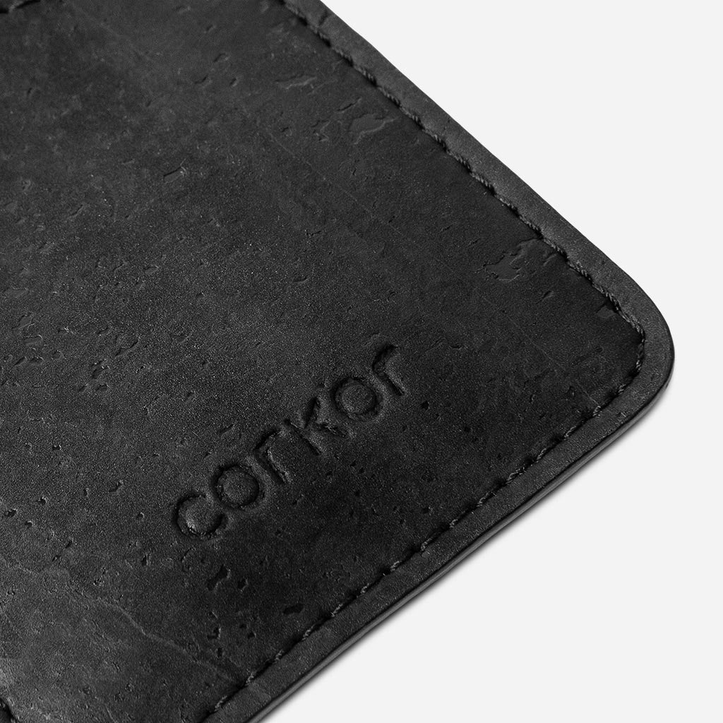 Closeup on the Corkor logo of the Cards sleeve Cork Wallet.