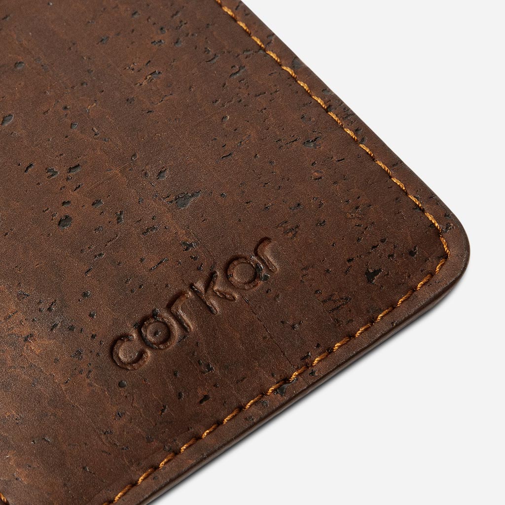 Closeup on the Corkor logo of the Cards sleeve Cork Wallet.