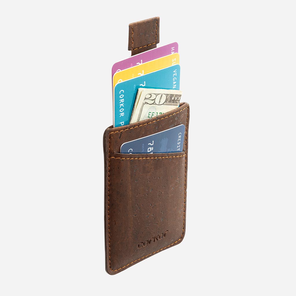 The Vegan Minimalist Cork Card Sleeve Wallet and its easy storage of cards and money.