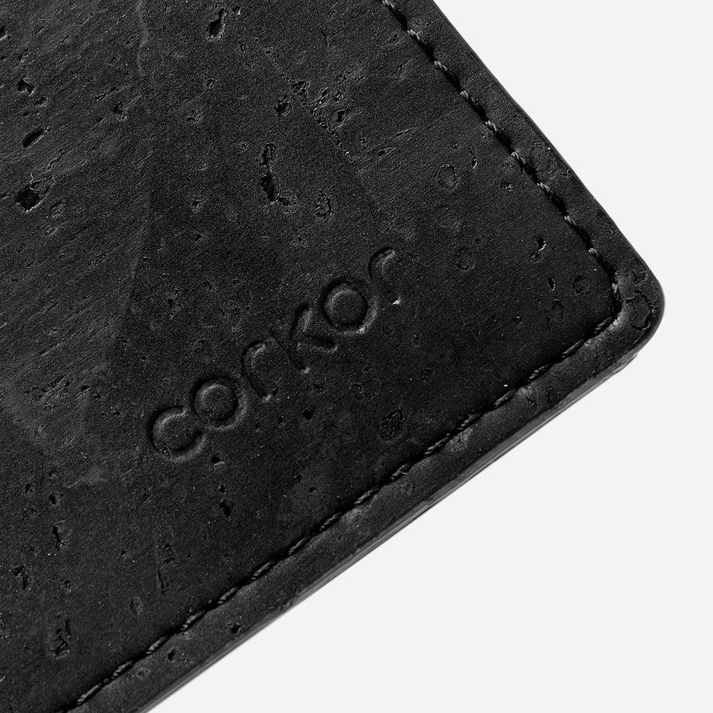 Closeup on the Corkor logo of the Cork Wallet with Coin Pocket.