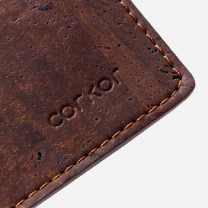 Closeup on the Corkor logo of the Cork Wallet with Coin Pocket.
