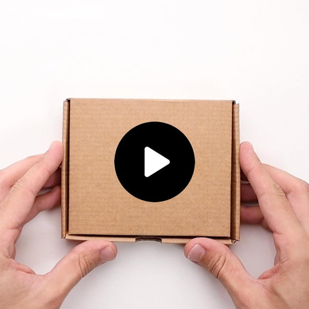 Unboxing of the Corkor logo of the Cork Passcase Wallet. #color_brown